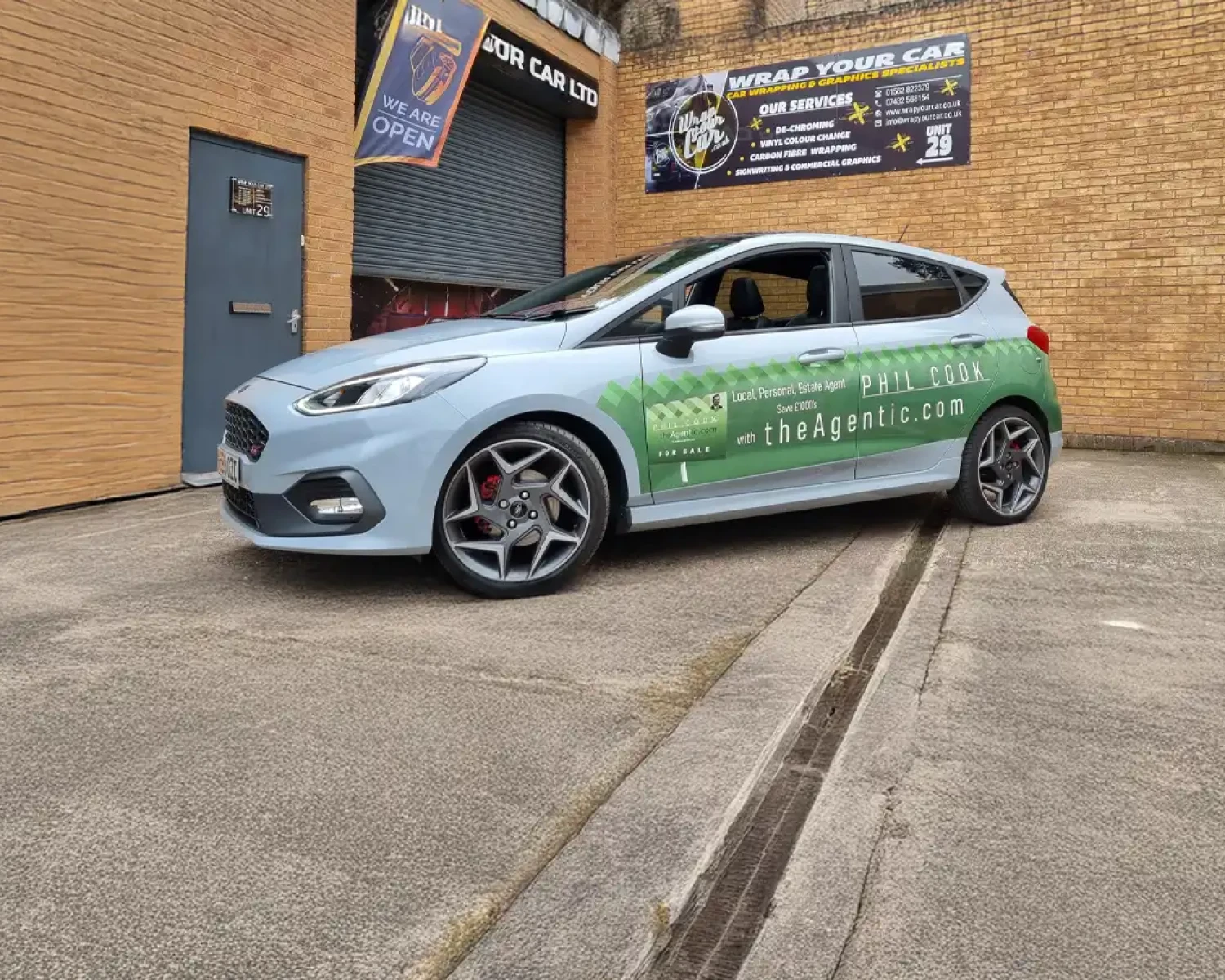 Wide front shot of Ford Fiesta wrapped for estate agent marketing in Worcestershire.