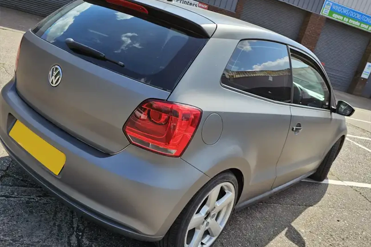 Rear three-quarter view of VW Polo with matte metallic grey colour change wrap at Wrap Your Car Kidderminster
