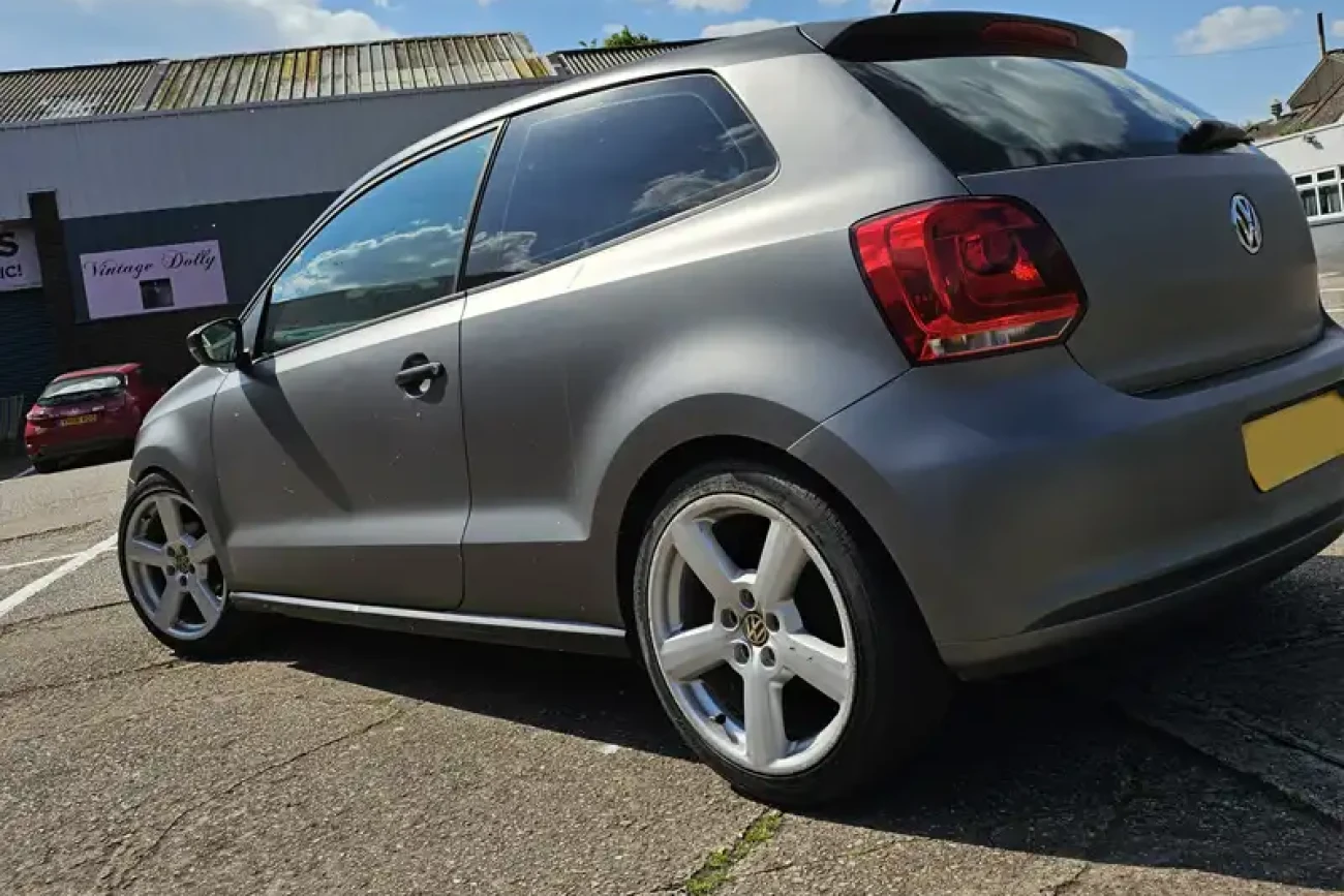 Rear side view of VW Polo finished in matte metallic grey colour change wrap at Wrap Your Car Kidderminster