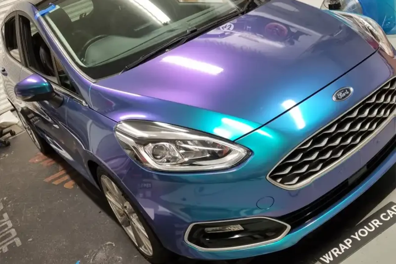 Front detail of Ford Fiesta flip colour change wrap showing blue to purple colour shift during installation at Wrap Your Car Kidderminster