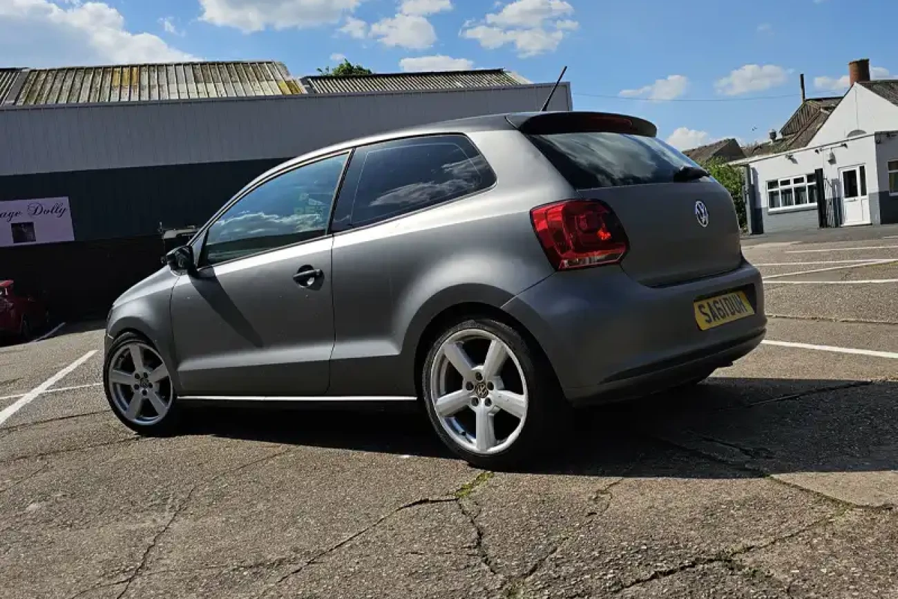 Rear angled view of VW Polo with matte metallic grey colour change wrap at Wrap Your Car Kidderminster