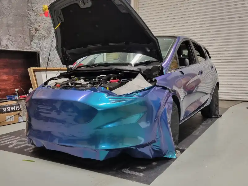 Ford Fiesta flip colour change wrap installation in progress on the front bumper at Wrap Your Car Kidderminster